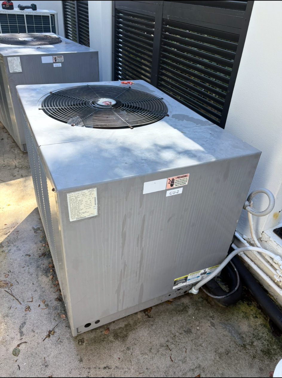 Old outdoor condenser before replacement